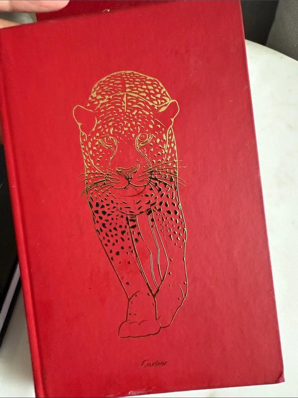 Cartier Red and Black Hardcover Notebooks with Gold Accents